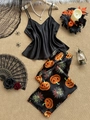 Détail du pyjama d'Halloween en satin avec imprimés citrouilles et accessoires décoratifs - S / Impression d'Halloween