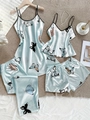 Ensemble de pyjama en satin à imprimé papillon disposé sur un tapis texturé blanc - S / Style Papillon Bleu