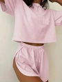 Detail van roze-wit gestreepte pyjamaset met zakje en tailleband met trekkoord - Roze Gestreept