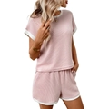 Completo due pezzi in maglia rosa con bordi bianchi a contrasto su maglia e shorts - S / Rosa