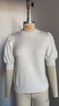 Women's white short sleeve knit sweater featuring stylish puff sleeves and a round neck - White (Physical Image)