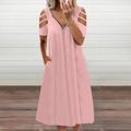 Detail of pink V-neck dress featuring a front zipper and stylish cold-shoulder cutouts - S / Bottoms / Pink