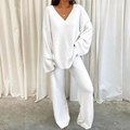 Detail of white plush loungewear set featuring V-neck top and wide-leg warm pants - White