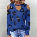 Detail view of royal blue off-shoulder long sleeve top with black leopard print pattern - Blue