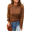 Close-up detail of waffle texture fabric and delicate lace patchwork on long sleeve top - Brown