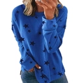 Detail of royal blue sweatshirt featuring black star patterns and ribbed cuffs - S / Royal Blue