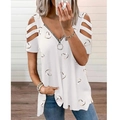 Dettaglio del top con scollo a V, stampa a cuore dorata, cerniera e spalle scoperte - Taglia S / Top / Bianco