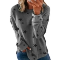 Detail of grey sweatshirt showing black star patterns and side slit hem design - S / Dark Gray