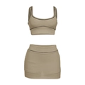 Detail view of khaki two-piece set featuring crop tank top and skirt with black piping edges - S / Khaki