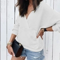 Women's white long sleeve hoodie featuring V-neck wrap design and front kangaroo pocket - S / White