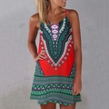 Detail of red summer mini dress featuring geometric prints and a deep V-neckline - S / Red