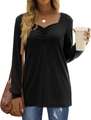 Detail of ruched V-neckline on long-sleeve black top paired with denim jeans - S / Black
