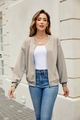 Detailed cable knit texture of beige zip-up jacket with ribbed cuffs and casual style - Khaki