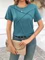 Detail of teal short sleeve t-shirt featuring unique crossover stitching on the front - S / Blue