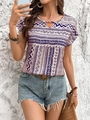 Detail of bohemian geometric print on navy blouse with cut-out neckline and tassels - S / Off White