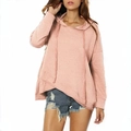 Detail of pink hoodie featuring unique asymmetrical overlapping hem and soft cotton fabric - S / Pink