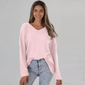 Detail of light pink waffle knit fabric on a loose V-neck long sleeve sweater for women - S / Pink