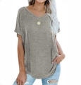 Close-up of loose grey V-neck T-shirt showing soft textured fabric and curved hemline - S / Gray