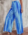 Detailed shot of high-waisted loose wide-leg pants with blue and white abstract stripe print - S / Blue