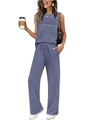 Close-up of pleated mauve sleeveless top and high-waisted drawstring trousers set - Navy Blue