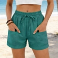 Détail du short à taille haute avec cordon de serrage et grandes poches plaquées - S / Vert malachite