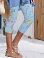 Damen Capri-Yogahose in Hellblau mit Blumenmuster für sommerliche Sportbekleidung - S / Blau