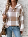 Close-up of checkerboard plaid pattern hoodie with functional button neckline details - S / Brown