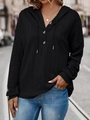 Women's black oversized hoodie with V-neck button detail and adjustable drawstring - S / Black
