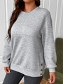 Detail of grey waffle-knit sweatshirt with side buttons and ribbed crew neck texture - S / Gray