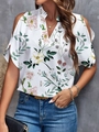 Detail of V-neck off-shoulder floral blouse showing lightweight fabric and pattern - Color 2
