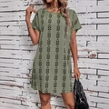 Olive green bohemian shift dress with black leaf prints and batwing short sleeves - S / Army Green