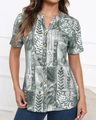 Close-up of tropical leaf print patchwork and wooden buttons on casual short sleeve shirt - S / Gray
