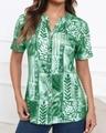 Detail of green V-neck short sleeve shirt with abstract leaf print and button closure - S / Light Green