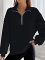 Macro detail of black quarter-zip sweatshirt featuring waffle texture fabric and white piping - S / Tops / Black