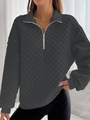 Detailed view of women's black waffle texture sweatshirt with white half-zip and stand collar - S / Tops / Gray