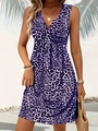 Detail shot of purple leopard print sleeveless mini dress with deep V-neck design - Purple