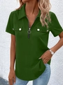 Detail of dark green polo shirt featuring a silver metal zipper and decorative chest pockets - S / Tops / Green