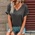 Detail of dark grey V-neck T-shirt showing rolled sleeves with three decorative buttons - Dark Gray