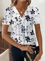T-shirt da donna con scollo a V bianca con eleganti motivi floreali e foglie nere - Foglia Bianca