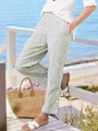 Vertical green striped summer linen trousers for women featuring decorative side buttons - Army Green