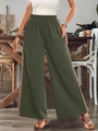Détail du pantalon large taille haute avec ruban latéral à motifs géométriques bohèmes - S / Vert Militaire