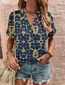 Detail of V-neck floral summer blouse with buttons and high-quality printed fabric - Navy Blue