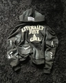 Macro detail of Y2K hoodie featuring Literally Just A Girl embroidery and silhouette prints - XS / Black