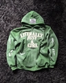 Detail of dark green Y2K hoodie featuring white applique embroidery and graphic prints - XS / Dark Green