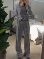 Detailed view of striped pajamas set with drawstring waist and loose-fit lounge pants - S / Top And Bottom / Black