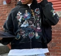 Dark grey washed hoodie with Righteous graphic print and religious street art - Black