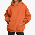 Women's oversized bright orange hoodie with front kangaroo pocket and ribbed cuffs - Orange