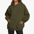Deep olive green oversized hoodie for women featuring a kangaroo pocket and rib-knit cuffs - Army Green