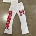 Weiße Baggy-Jogginghose mit rotem Graffiti-Print und offenem Saum im Y2K-Stil - S / Weiße Hose