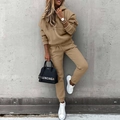 Detail of khaki two-piece hoodie and sweatpants set featuring thick cotton knit fabric - Brown